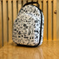 Mochila Black Clover Hat Caddie StrapVacation Nation Blanco Negro 6Pcs